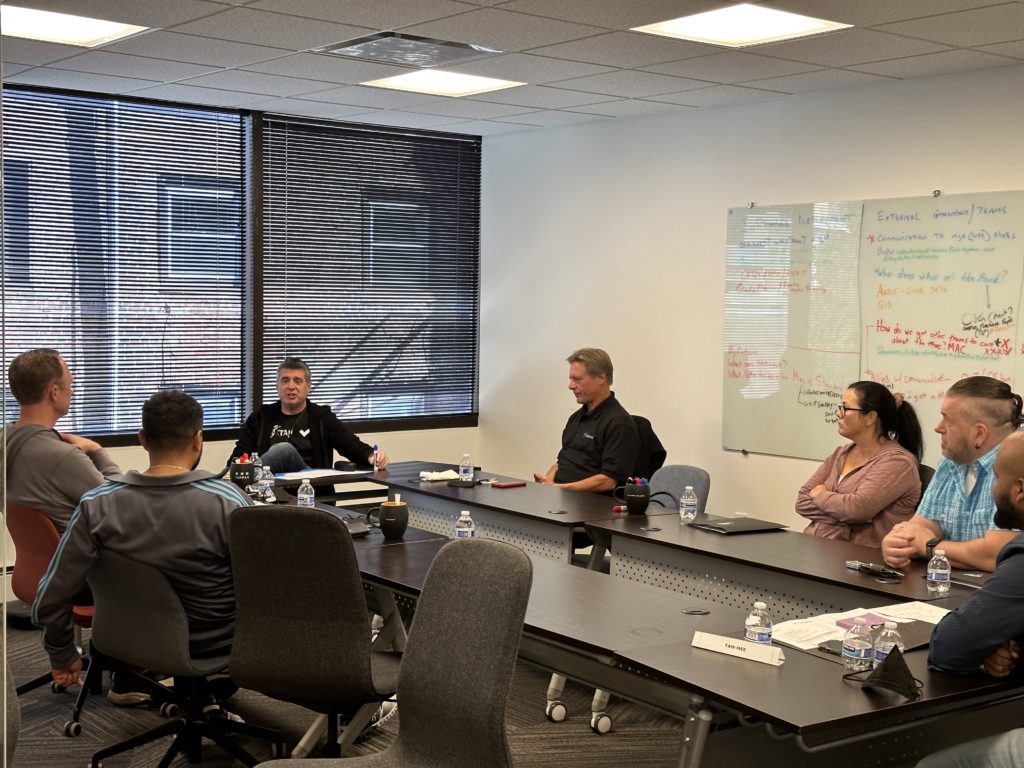 Jeff joins the Mac Engineering team to discuss their roadmap for 2023, surrounded by whiteboards, water bottles, and big ideas.