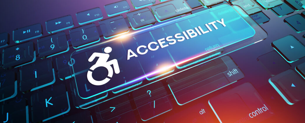 A blue keyboard with a large button showing a person in a wheelchair moving forward and the word "Accessibility" displayed.