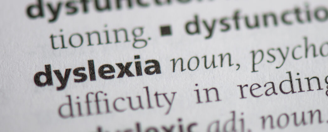 Close up of the word dyslexia in a dictionary.